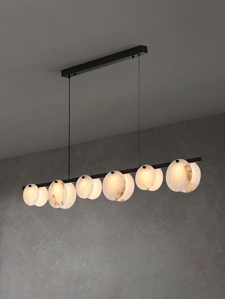 a long light fixture hanging from the ceiling