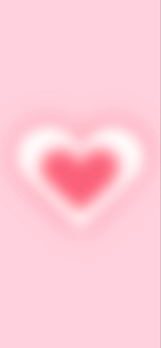 a heart shaped object on a pink background