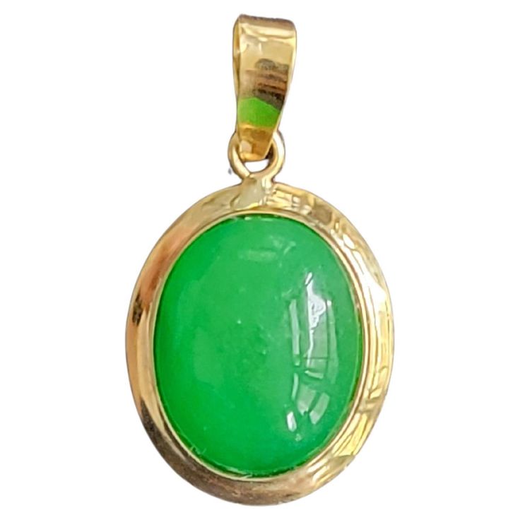 Drop and Dangle Jadeite Pendant with solid 14K Yellow Gold. Jadeite Cabochon engulfed in 14K Yellow Gold Circumference and chain hook. ‘The Qīng Zhong Jade Pendant’ represent nature’s colors in Mandarin and means clear or pure. Its the medium sized 'Zhong' version of our 'Qing Jade Pendant'. The Chinese character for Qing is composed of "water" (氵) and "azure" (青) which are associated to the water element in Chinese philosophy. The water imagery and clean silhouette of this pendant makes a striking impression and enhances the beauty of the jadeite stone in the center. Crafted in 14K gold, the ‘Qīng Zhong Jade Pendant’ is handset with a beautiful green jade gemstone. Matching Qīng Zhong Jade ring and earrings are also available. Materials: 0.45g 14K Gold, 0.39g Jadeite Dimensions: 19 x 11 x Chinese Philosophy, Jade Gemstone, Water Element, Jade Ring, Jade Pendant, Green Jade, Jade Green, Jewelry Necklace Pendant, Jade