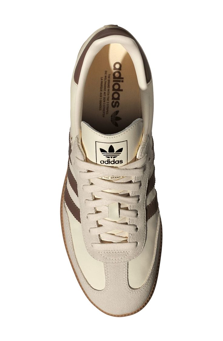 From the soccer field to the streets, this always-original sneaker maintains its legacy with premium materials and iconic 3-Stripes at the sides. Cushioned footbed Leather and synthetic upper/synthetic lining/rubber sole Imported Sneakers Dressed Up, Brown Sambas Outfits, Trending Sneakers 2024, Trendy Sneakers 2024, Womens Brown Sneakers, White Sambas Women Outfit, Womens Sneakers Outfit, Sambas Outfit Woman, Fall Shoes 2024