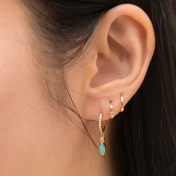 Oval Turquoise Drop CZ Pave Hoop Earrings are made of 925 sterling silver dipped in 18k gold for extra shine and durability. The faceted Turquoise catches extra light for more sparkle. Shine bright whenever you wear them. Minimalist and elegant earrings that match with everything and can be worn for any occasion. These delicate earrings are perfect to wear alone or stack them with other earrings. Delicate and timeless Affordable Luxury Jewelry. The beautiful pieces perfect for giving to a specia Pave Hoop Earrings, Forward Helix Earrings, Conch Earring, Flat Back Earrings, Tragus Earrings, Hypoallergenic Jewelry, Diamond Hoop Earrings, Delicate Earrings, Single Earring