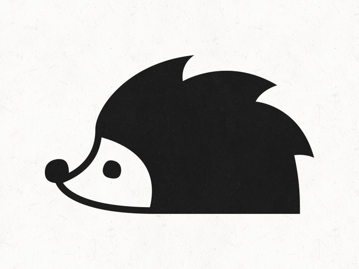 the hedgehog is black and white, but it looks like he's looking for something to eat