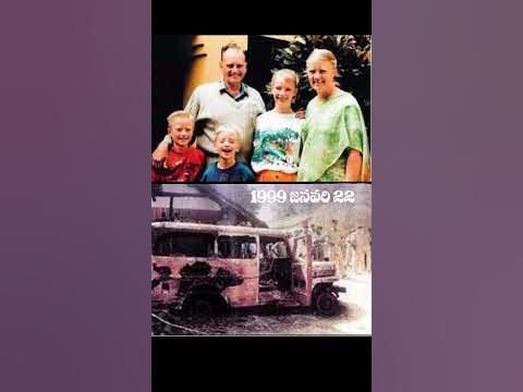 the family is posing in front of an old truck with their two children on it