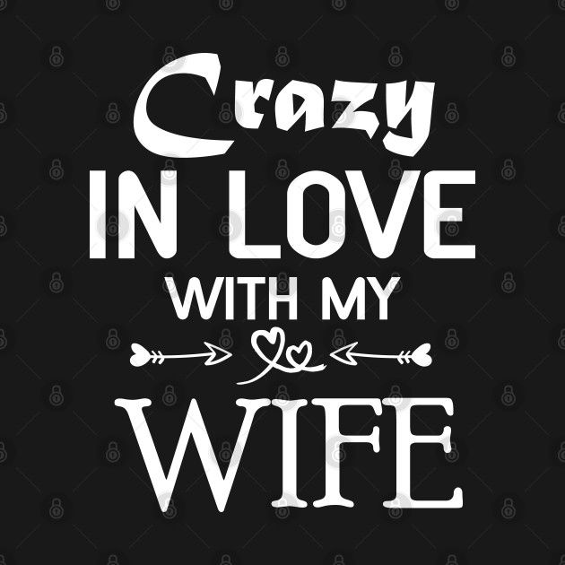 the words crazy in love with my wife on a black background, and an arrow