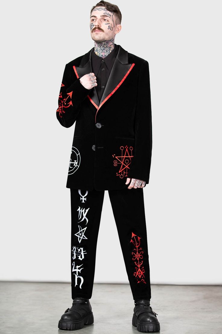 BEELZEBUB.- Statement non-stretch velvet fabric.- Contrasting satin collar.- Statement custom embroidery details.- XL peaked lapels.- Functional welt pockets.- Button down closure.- Classic suit jacket sillhouette.- Fitted.- Unisex, so it's for everyone! with KILLSTAR branding, Fabric 1: 100% Polyester. Trim: 97% Polyester, 3% Elastane. Lining: 95% Polyester 5% Elastane.Do not wash / Do not bleach / Do not tumble dry / Do not iron / Dry clean. Imported. Winter Single Breasted Velvet Suit, Winter Velvet Single Breasted Suit, Single Breasted Velvet Suit For Winter, Winter Velvet Single-breasted Suit, Long Sleeve Suits For Winter Costume Party, Winter Velvet Suits With Lapel Collar, Winter Costume Suits With Long Sleeves, Velvet Long Sleeve Tuxedo Style Outerwear, Velvet Tuxedo Style Long Sleeve Outerwear