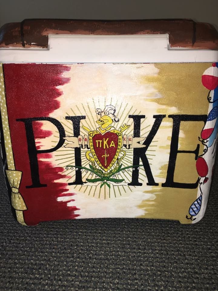 a cooler with the word pike painted on it