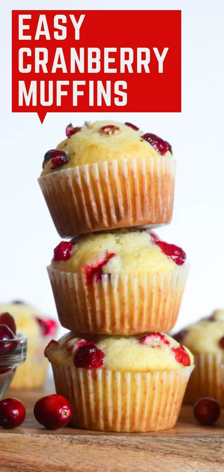 three cranberry muffins stacked on top of each other with the words easy cranberry muffins above them