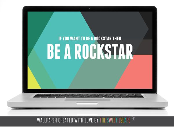 a laptop with the words be a rockstar on it and an image of a colorful background