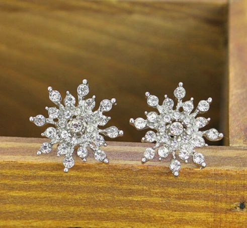 These gorgeous snowflake earrings can be dressed up for the holidays or paired with a casual look! Would be great for your little Frozen, Elsa fan as well!! Dimensions: 3/4" in diameter Festive jewelry Elegant Snowflake, Snowflake Earrings, Ear Earrings, Gemstone Stud Earrings, Hair Spray, White Snowflake, Wedding Jewelry Earrings, Gemstone Studs, Christmas Jewelry