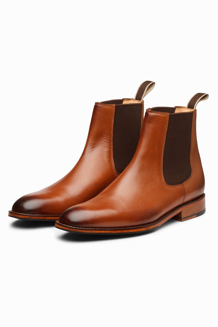 Tan leather Chelsea boots features hand built Argentinean leather sole with rubber forepart, full grain calfskin leather, and rich tan DD lining.
Composition: Leather
Color: Brown
Other Details: 
Weight (in kg) : 1
Heel height (in inch): 1 - Aza Fashions Chelsea Boots For Men, Brown Leather Chelsea Boots, Men Footwear, Chelsea Boots Men, Boots For Men, Leather Chelsea Boots, Fashion App, Hand Built, Aza Fashion