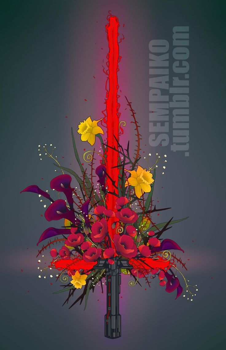 an artistic display of flowers in a glass vase