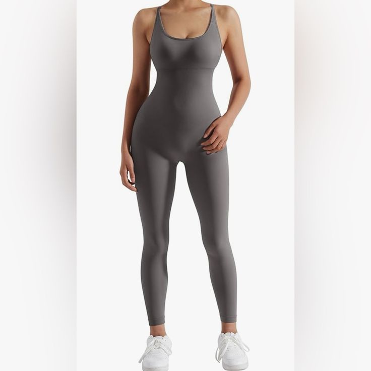 94% Nylon 6% Spandex Criss Cross Back One Piece Jumpsuit With Removable Pads, Adjustable Spaghetti Straps, Open Back And Scoop Neck Ribbed Textured Tummy Control Waist High Waist Scrunch Butt Squat Proof, Moisture-Wicking, Non See Through Seamless Stretch Bodysuit For Sports, Sleeveless Seamless Bodysuit For Workout, Solid Backless Bodysuit For The Gym, Solid High Stretch Bodysuit For Pilates, High Stretch Solid Bodysuit For Pilates, Compression Seamless Bodysuit For Pilates, Seamless Sports Bodysuit In Elastane, Seamless Compression Bodysuit For Pilates, High Stretch Shapewear Unitard