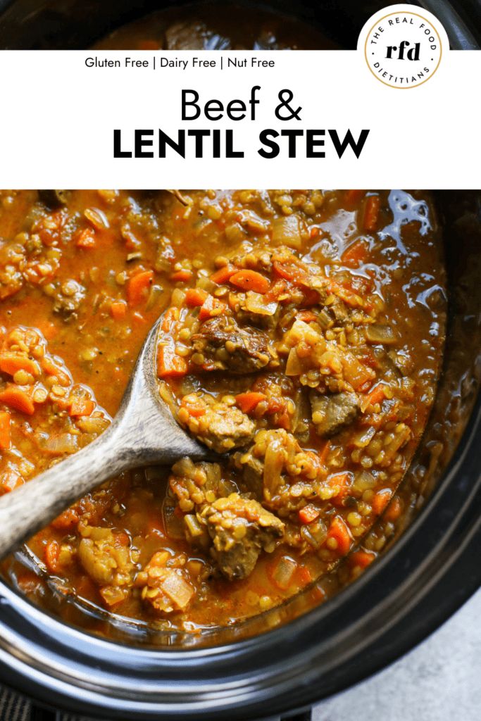 a slow cooker filled with beef and lentil stew