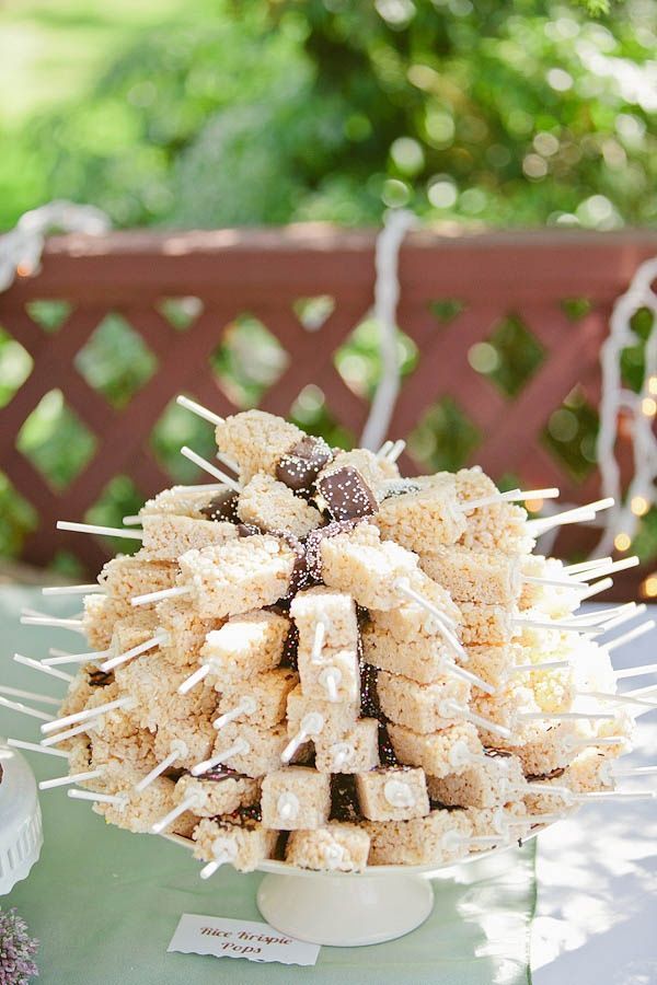 there is a cake made out of cookies and marshmallows on the table