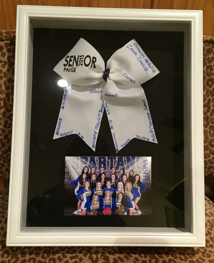 a group of cheerleaders is framed in a white frame with the word senior page on it