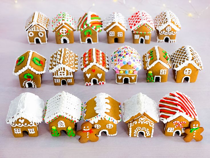 a group of small gingerbread houses sitting next to each other