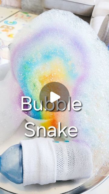 the bubble snake is sitting on top of a plate