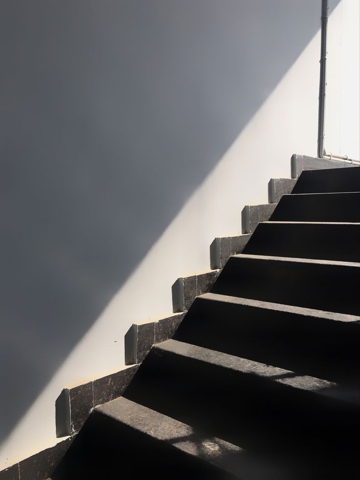 the sun is shining down on some stairs