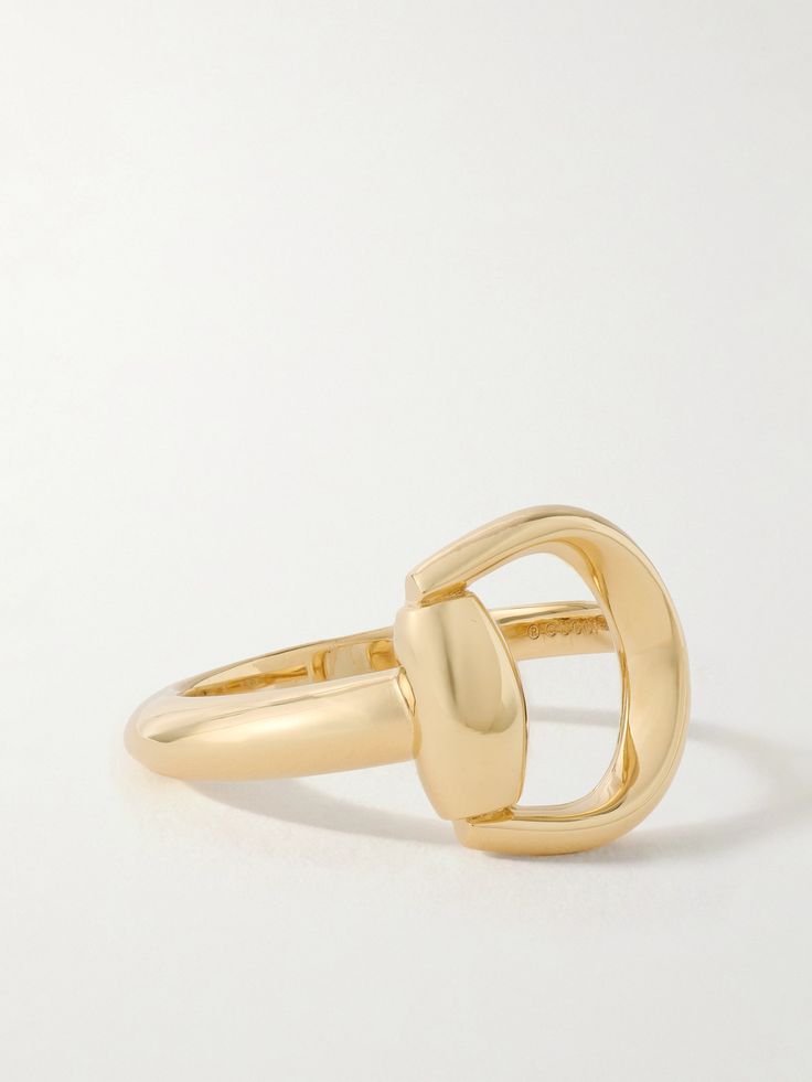 Gucci's 'Horsebit' detail originally debuted in 1953 on a pair of loafers and has since become an iconic symbol that's synonymous with the house. This ring is made from 18-karat gold in a slim shape that's cast to look like part of the embellishment wrapped around your finger. Classic Gucci Yellow Gold Ring, Gucci Designer Rings In 14k Gold, Gucci 14k Gold Designer Rings, Gucci Yellow Gold Rings For Formal Occasions, Designer Gucci 14k Gold Rings, Gucci 14k Gold Rings For Formal Occasions, Gucci Rings With Polished Finish For Formal Occasions, Gucci Horsebit, Flat Dress Shoes