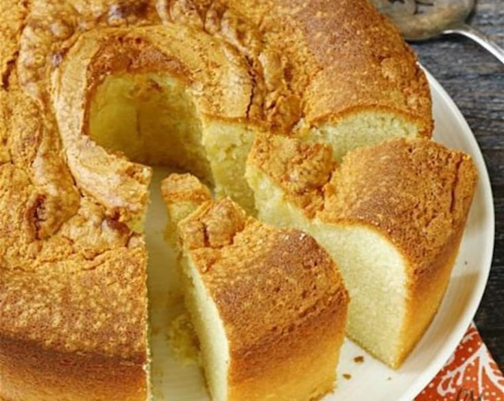 a bundt cake is cut into slices on a plate