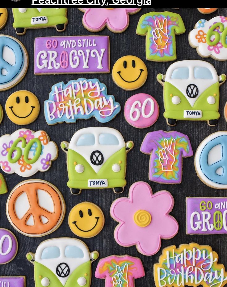 decorated cookies with happy birthday and peace signs