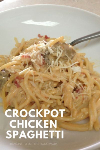 a white plate topped with spaghetti and meat