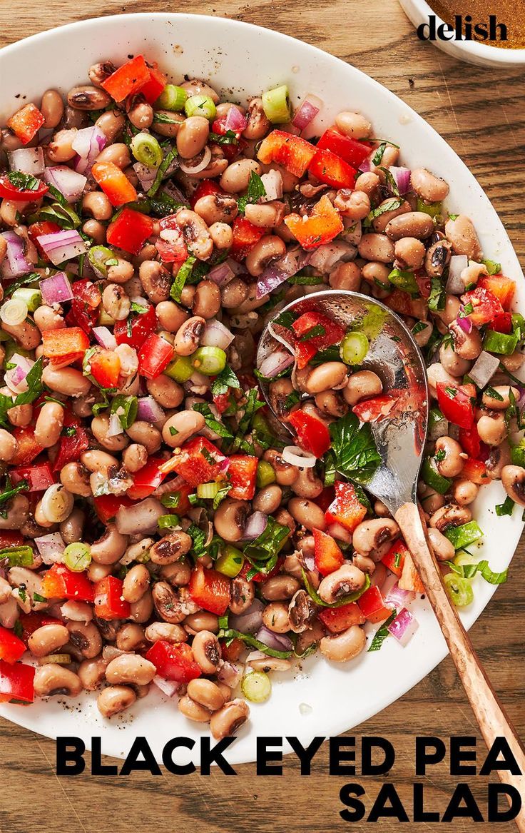 a white plate topped with black eyed pea salad