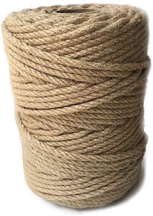 a spool of jute twine on a white background with a red sticker