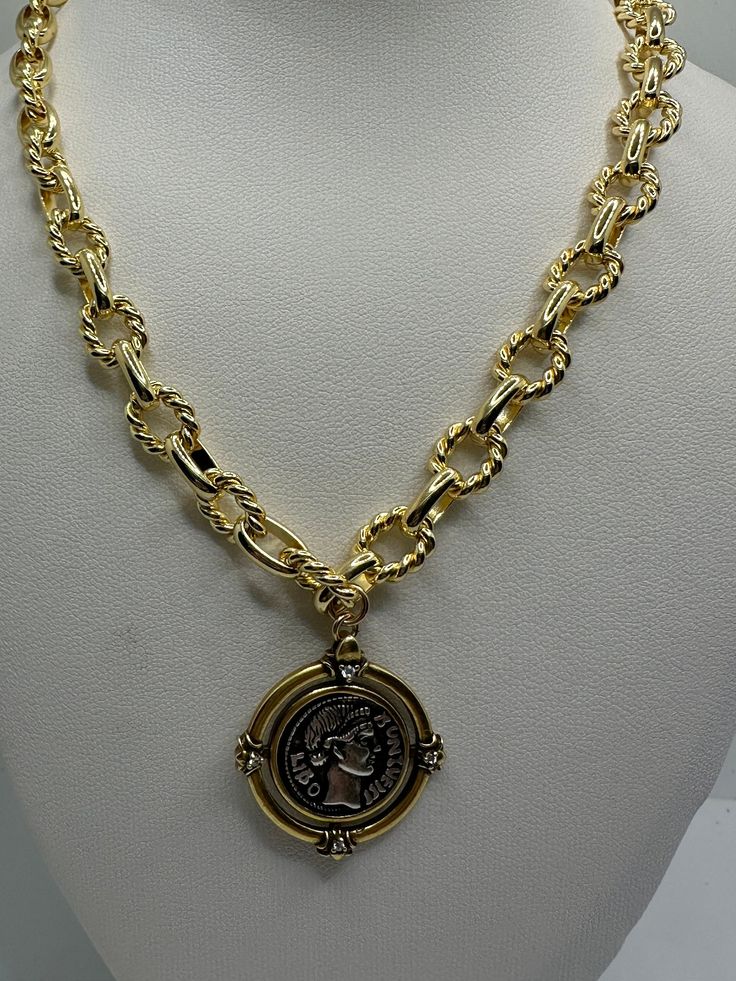 Our gold plated chain is made the highest quality We use gold filled components. 14K Gold plated  thick textured Shape link chain with Antique Bronze gold plating vintage medallion coin The vintage thick gold plated  necklace has a  long lasting color retention The necklace can be made in 18 Inches or 20 inches This chic Gold Chunky necklace gives a sophisticated look with any outfit! Gold Round Medallion Necklace, Metal Figaro Chain Necklace, Gold Plated Pendant Chain Necklace, Gold Toggle Necklace With Round Metal Pendant, Gold Coin Necklace With Chain, Gold Toggle Necklace With Round Pendant, Gold Round Coin Necklace With Chain, Gold-tone Metal Chain Necklace With Round Pendant, Gold-tone Metal Coin Necklace