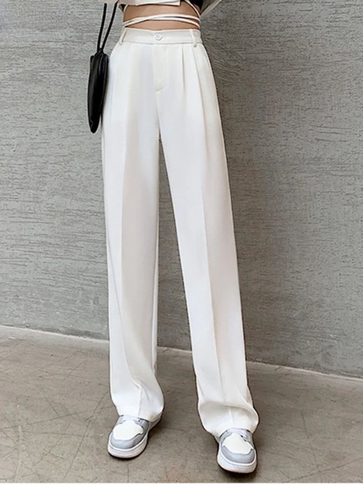 SPECIFICATIONSBrand Name: XIBUSANAStyle: CasualAge: 25-34Origin: Mainland ChinaCN: GuangdongSeason: SummerWaist Type: highDecoration: ButtonElasticity: Slight StrechFabric Type: BroadclothPattern Type: SolidPant Style: STRAIGHTMaterial: POLYESTERFit Type: LOOSELength: full lengthClosure Type: button flyGender: WOMENFront Style: FlatChoice: yes Suggestion: The long is 6cm longer than the regular, the regular whose height is less than 163cm, and the long if the height is above 164cm. "2205 "is dou Loose Wide Leg Pants, Spring Trends Outfits, Perfect Figure, Suit Pant, Long Trousers, Loose Style, Pantalon Large, Pant Style, Solid Pattern