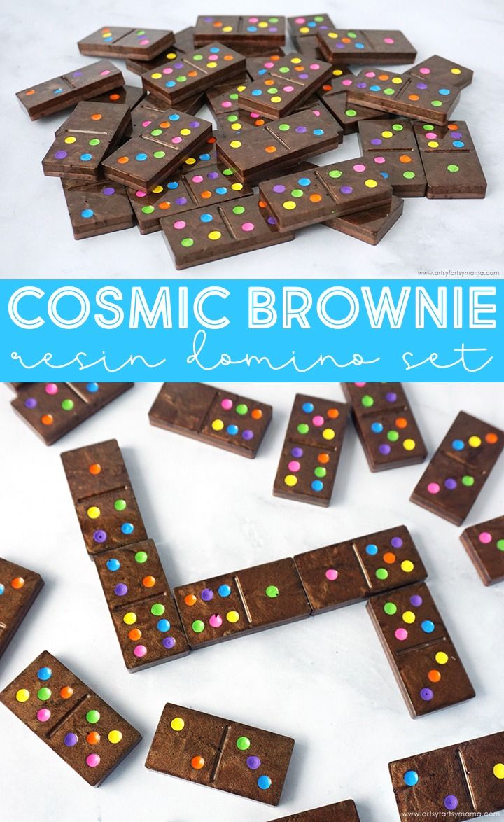 chocolate brownies with colorful sprinkles on top and the words cosmic brownie written