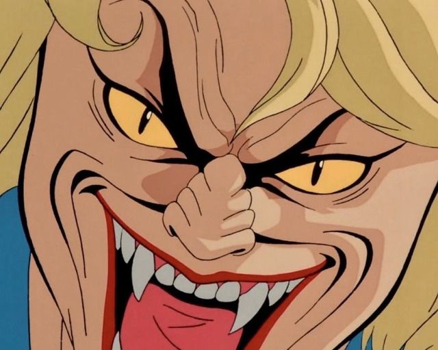 an animated face with yellow eyes and blonde hair is shown in this cartoon character's image