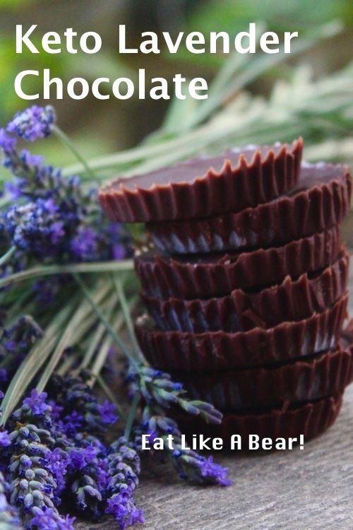 chocolates stacked on top of each other next to lavender flowers