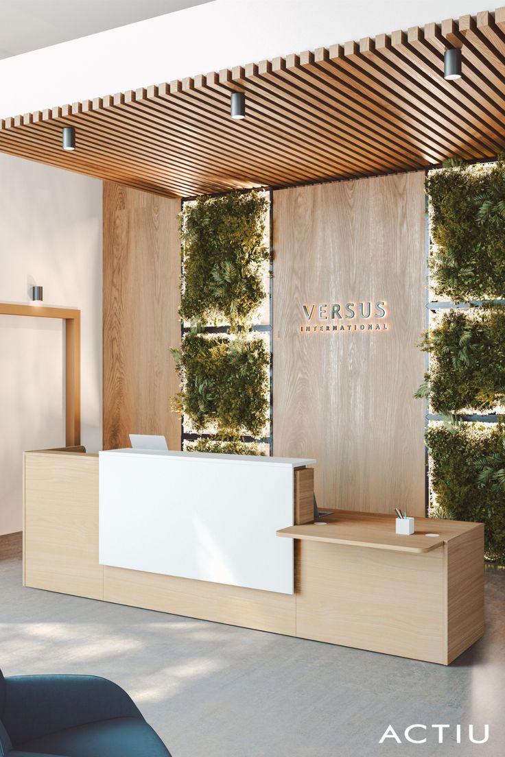 a reception area with wood paneling and plants on the wall, along with a blue chair