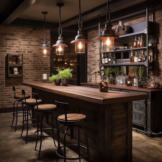 a bar with stools and lights hanging from the ceiling