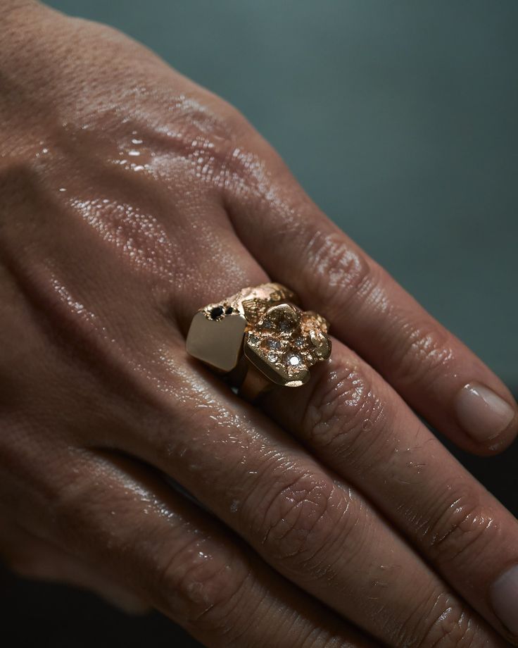 Face of the signet ring is slightly angled to give it more extraordinary look in classic form. Rough texture on the sides with deep matte finish. Flat, high polished on top and satin finished on the inside. 3mm deep red garnet and 1.4mm black diamond hidden in the detail. Hand carved and finished using artisan techniques. Made of solid 14k (585) yellow gold. Due to the price of gold, different sizes have different prices. Note that all products are made to order. Please allow approximately 3-6 w Unique Guy Gifts, Mens Gold Signet Rings, Mens Signet Ring, Male Ring, Mens Ring Designs, Mens Gemstone Rings, Rough Texture, Mens Gold Rings, Signet Rings