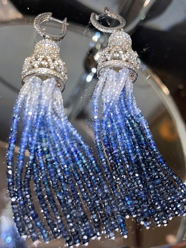 Luxury Sapphire Drop Jewelry, Dazzling Blue Diamond Earrings, Dazzling Blue Earrings With Diamond Accents, Luxury Diamond Dangle Crystal Earrings, Blue Diamond Earrings With Diamond Cut, Blue Diamond Cut Earrings, Fine Jewelry Sapphire Earrings With Diamond Cut, Sapphire Diamond-cut Earrings, Exquisite Sapphire Earrings With Diamond Accents