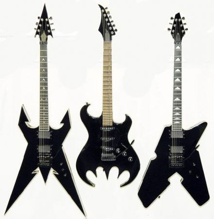 three electric guitars are shown in black and one is shaped like an animal's head