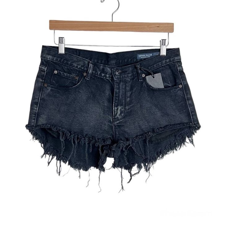 Denim Colab Saltwater & Song. Low To Mid Rise Cutoffs. Super Frayed Hem. Zip Fly & Button Closure. Classic Five Pocket Styling. 100% Cotton. Raven Faded Black. Size 29. 2” Inseam 8.5” Rise 16.25” Waistband, Flat Across Condition: Nwt. New. Black Washed Short Jeans, Short Black Washed Jeans, Edgy Washed Black Cutoff Bottoms, Black Cutoff Grunge Jeans, Edgy Dark Wash Cutoff Bottoms, Edgy Washed Cutoff Bottoms, Grunge High Rise Jean Shorts For Streetwear, Dark Wash Short Length Grunge Jeans, Grunge Style Dark Wash Short Jeans