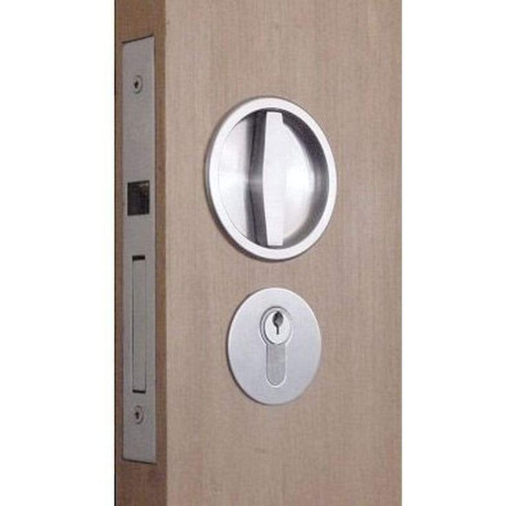 an open door with the handle on it and a keyhole in the middle is shown