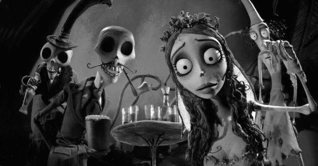 the corpse bride and two skeletons are standing in front of a table full of candles