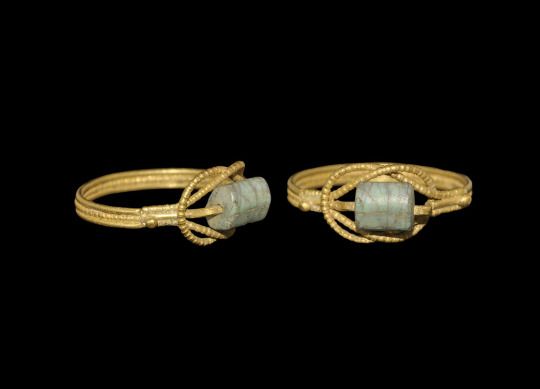 Ancient Jewels anGold Greek ring featuring a Hercules knot and a bead, possibly turquoise, c. 5th-3rd centuries BCE. From Timeline Auctionsd Jewelry