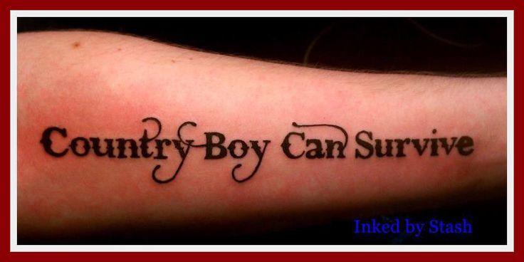 a tattoo with the words country boy can survive written in cursive font on it