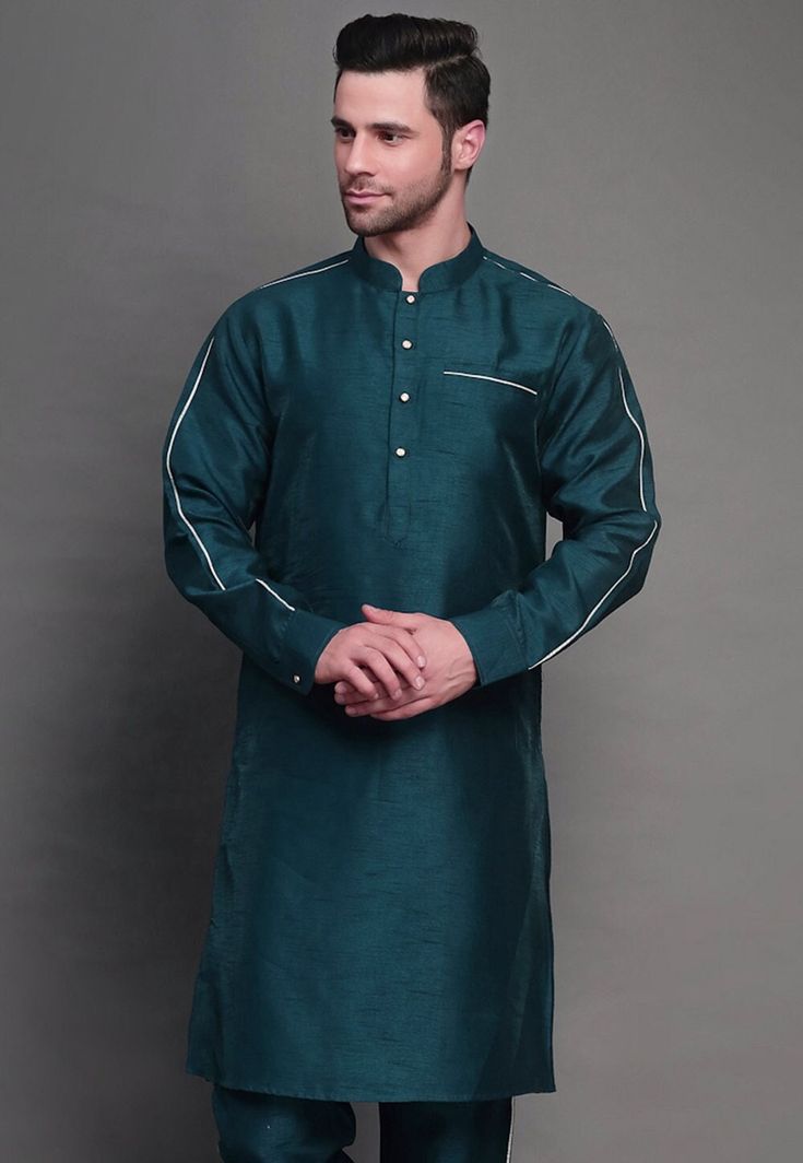 Art Silk Kurta in Teal BlueThis Readymade piece is Enhanced with Buttons. Crafted in Chinese Collar Neck and Full SleeveDo note: Bottom shown in the image is for presentation purposes only. Half to one inch may vary in measurement. (Slight variation in actual color vs. image is possible)           We sell all kinds of menswear. Mens Kurta | Mens Kurta Pajama | Mens Sherwani | Mens Sherwani Sets | Traditional Menswear | Partywear Menswear | Indian Mens Dresses | Diwali Kurta | Kurta Pajama | Boll Blue Cutdana Kurta For Ceremonial Occasions, Ceremonial Blue Handloom Traditional Wear, Ceremonial Blue Traditional Wear Handloom, Ceremonial Blue Kurta With Cutdana, Kurta Shirt For Men, Ice Blue Kurta Men, Teal Kurta For Men, Festive Blue Jamawar Kurta, Menswear Indian