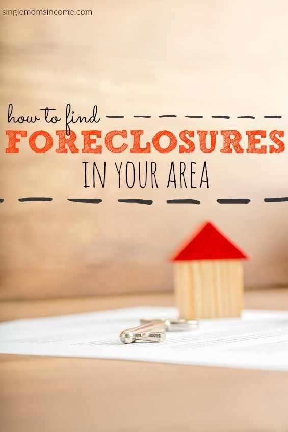 a pair of keys sitting on top of a piece of paper with the words how to find foreclosures in your area