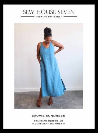 a woman in a blue dress with the words sew house seven sewing patterns on it