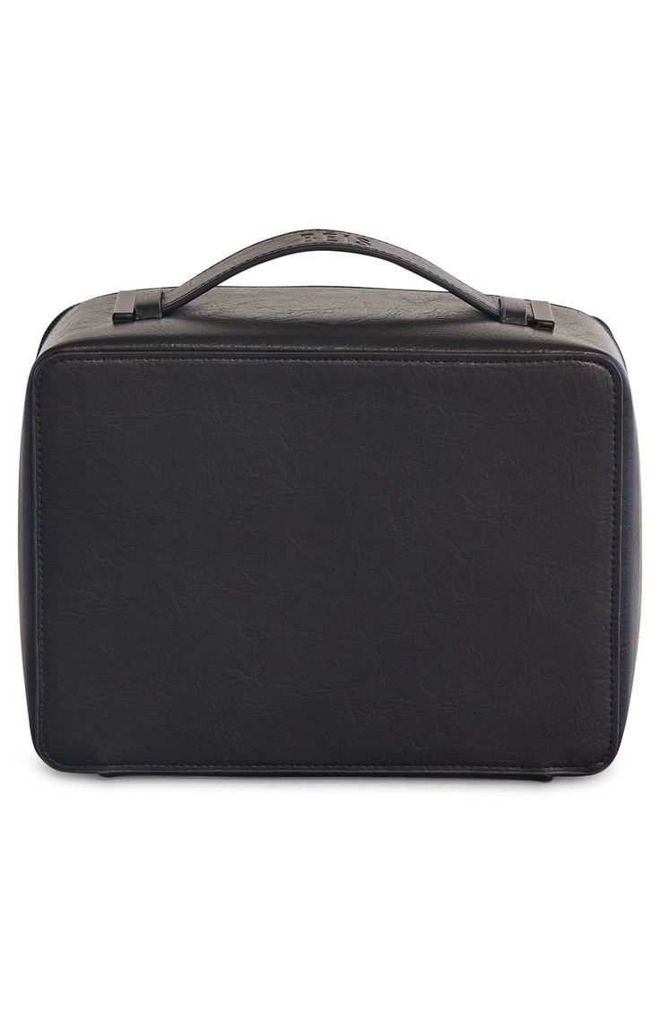 Easily organize cosmetics, makeup brushes and other small essentials in a structured travel case with a convenient top carry handle. Inside the main compartment, a removable sleeve features a brush holder on one side and a zip pocket on the reverse to keep small items organized. Top zip closure Carry handle Interior removable sleeve for makeup brushes; interior mirror Polyester/PVC/polyester/nylon/metal Spot clean Imported Asian Owned and Founded Rectangular Cases With Zipper Closure For On-the-go, Rectangular Travel Accessories Case With Zipper For On-the-go, Rectangular Travel Cases With Zipper Closure, Rectangular Travel Case With Zipper Closure, Versatile Rectangular Case With Zipper Closure, Black Cosmetic Bag With Luggage Sleeve For Everyday, Black Cosmetic Bag With Luggage Sleeve, Rectangular Cosmetic Bag With Zipper For Travel, Rectangular Cosmetic Bag With Zipper For On-the-go