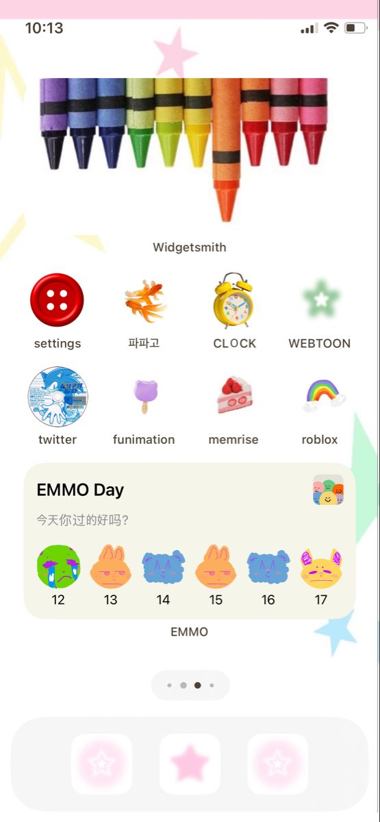 an iphone screen with the emmo day message and icons on it, including crayons