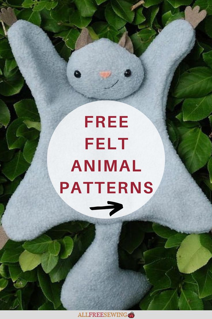 a stuffed animal with the words free felt animal patterns on it's chest and back