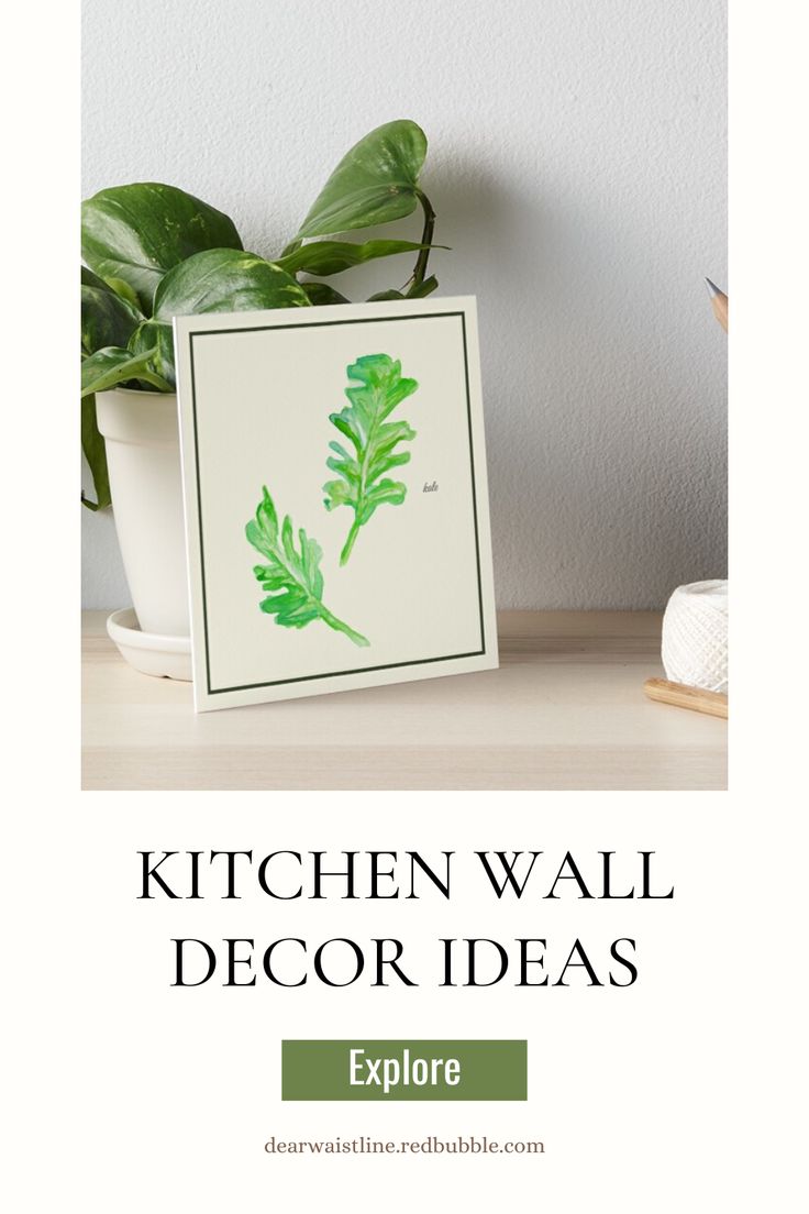 the kitchen wall decor idea is displayed next to a potted plant on a table